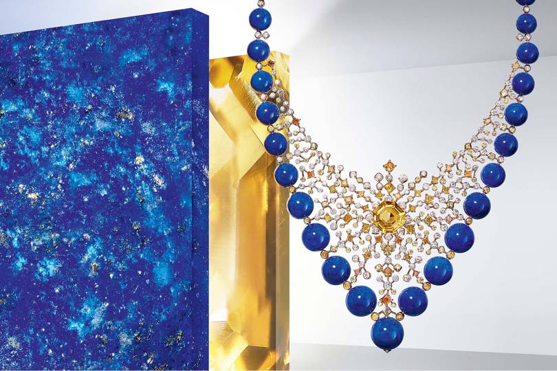 For this "Équinoxe" necklace from the "Magnitude" collection, Cartier's lacy openwork constellation consists of a nebula of yellow-orange and white diamonds, orange-toned yellow sapphire, and lapis lazuli #SuzyJewels – Place Vendôme: Jewellers Change Settings – For Customers And Gemstones-9