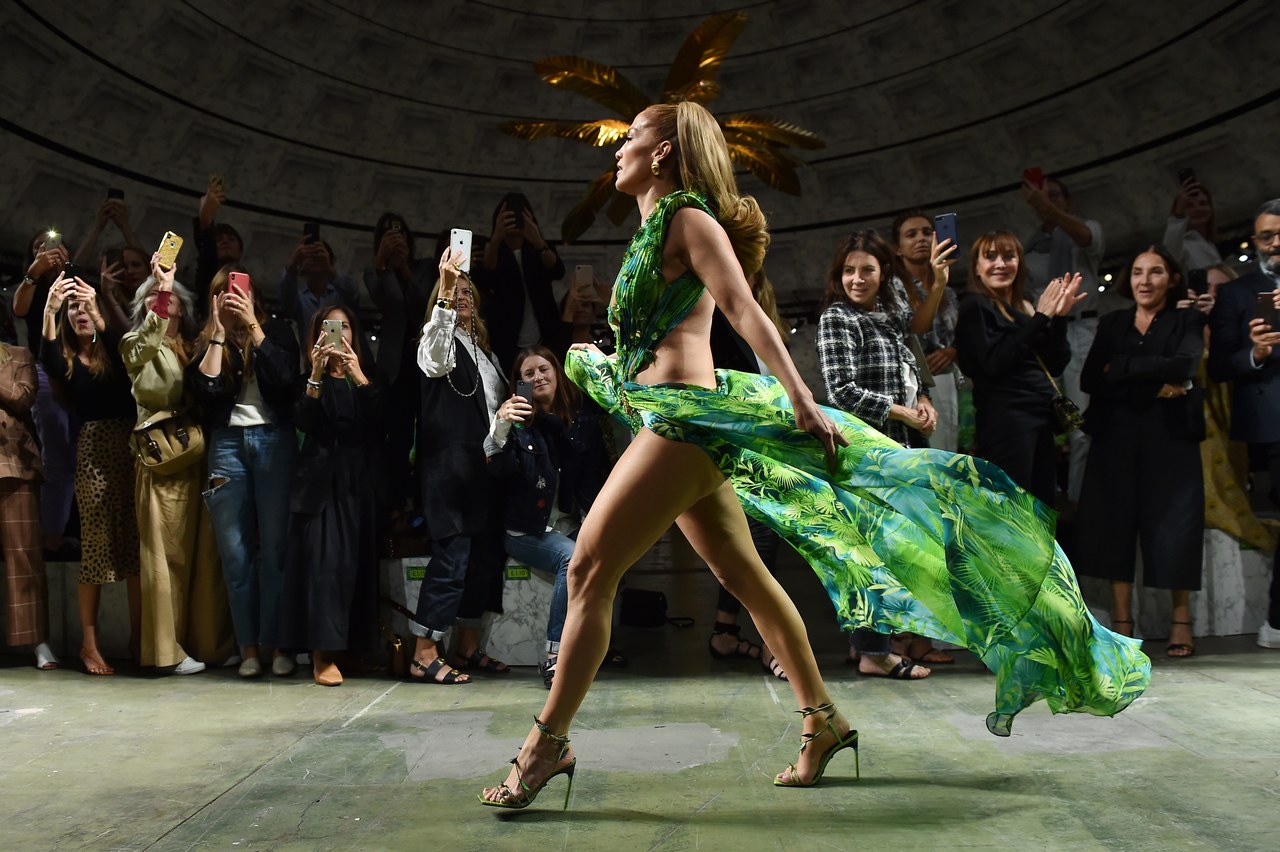 J. Lo takes a triumphant stride down the runway for Versace at the Spring/Summer 2020 shows, recreating the moment she stepped out in the original barely-there green leaf dress at the 2000 Grammy Awards #SuzyMFW: Versace Proves The Force Of Fashion-6